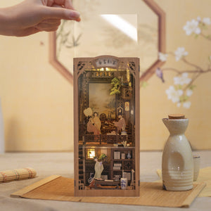Ink Rhyme Bookstore book nook kit assembled showing calligraphy desk and warm glow