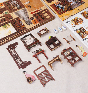 Ink Rhyme Bookstore miniature classical study scene close-up with golden glow